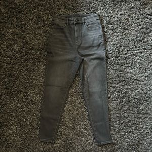 AE Size 8 Regular Length. High-waisted Mom Jean. Soft black.